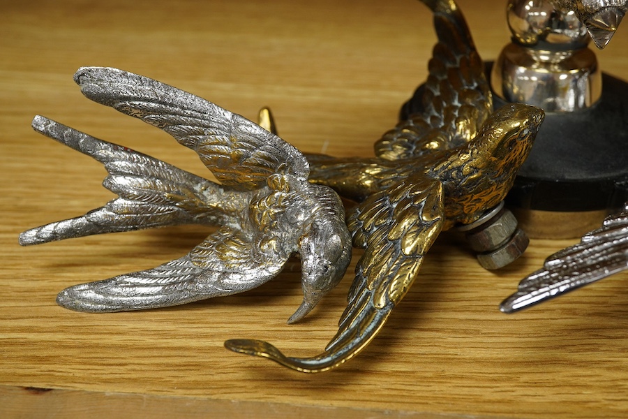 Five chrome plated bird themed car mascots, including three swallows, a partridge and an eagle. Condition - fair.